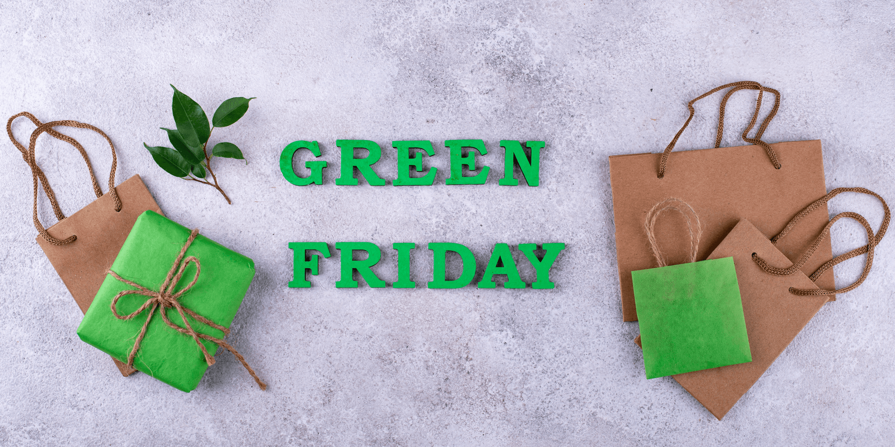 Green Friday bei Vintage Kontor: Nachhaltige Geschenke, braune Papiertüten und grüne Deko.